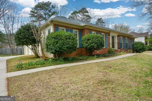 view of exterior entry with brick siding