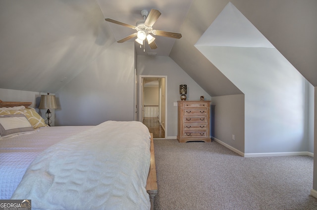 carpeted bedroom featuring a ceiling fan, baseboards, and lofted ceiling