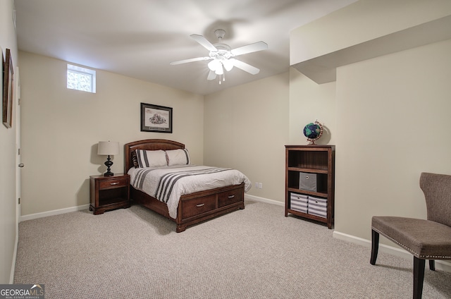 bedroom featuring a ceiling fan, carpet floors, and baseboards
