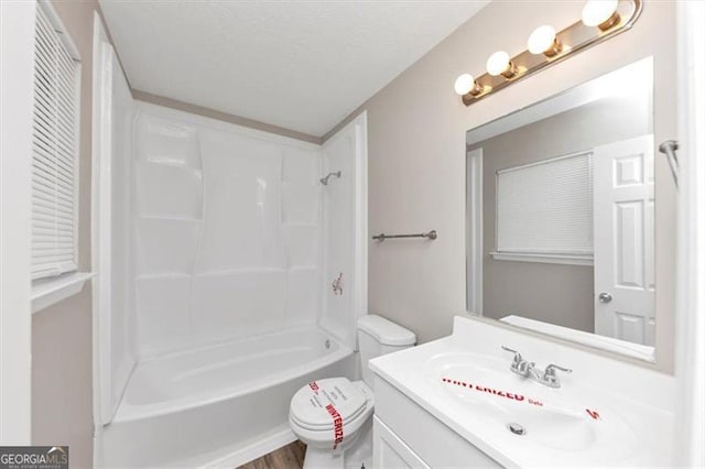 3671 Satellite Blvd, Ellenwood, GA 30294 - full bathroom featuring vanity, toilet, and shower / washtub combination