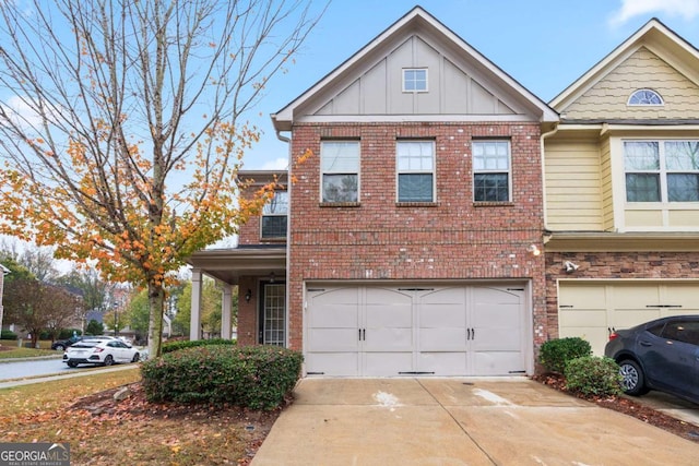3879 Brockenhurst Dr, Buford, GA 30519 - multi unit property featuring brick siding, an attached garage, and concrete driveway