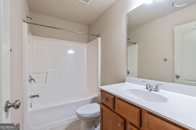 3879 Brockenhurst Dr, Buford, GA 30519 - full bathroom with bathing tub / shower combination, toilet, visible vents, and vanity
