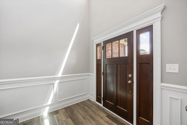 14 Carters Way, Forsyth, GA 31029 - foyer featuring a decorative wall, wainscoting, and dark wood-style flooring