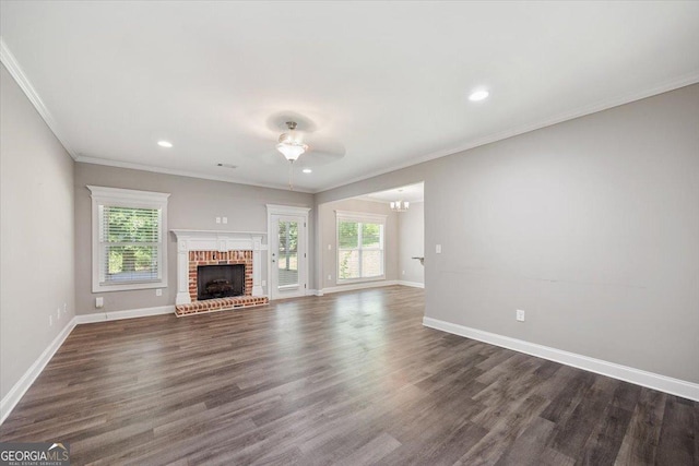 14 Carters Way, Forsyth, GA 31029 - unfurnished living room featuring baseboards, dark wood-type flooring, a brick fireplace, recessed lighting, and ceiling fan