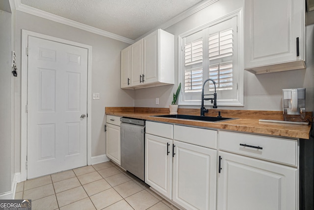 1875 Ebenezer Rd SW, Conyers, GA 30094 - kitchen featuring a sink, stainless steel dishwasher, wood counters, white cabinetry, and ornamental molding