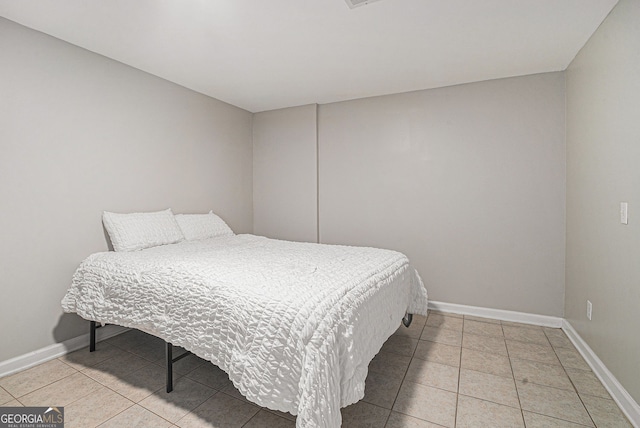 1875 Ebenezer Rd SW, Conyers, GA 30094 - bedroom featuring light tile patterned floors and baseboards