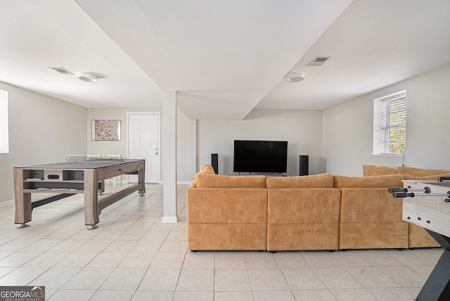 1875 Ebenezer Rd SW, Conyers, GA 30094 - living area featuring light tile patterned floors and baseboards