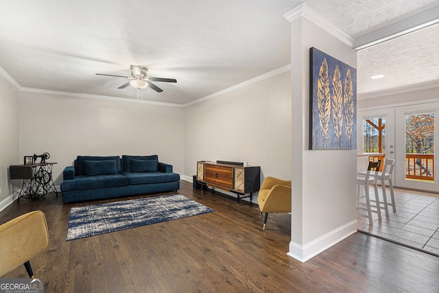 1875 Ebenezer Rd SW, Conyers, GA 30094 - living room with baseboards, ceiling fan, wood finished floors, and crown molding