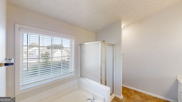 921 Dunagan Way, Lawrenceville, GA 30045 - bathroom with plenty of natural light, vanity, and a stall shower