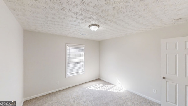 921 Dunagan Way, Lawrenceville, GA 30045 - spare room featuring carpet and a textured ceiling