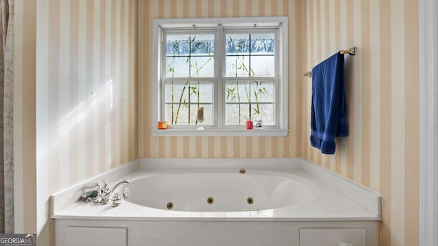 26 The Trl SE, Lindale, GA 30147 - bathroom featuring wallpapered walls and a tub with jets