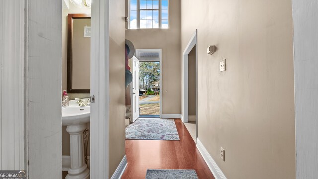 26 The Trl SE, Lindale, GA 30147 - foyer entrance featuring wood finished floors, plenty of natural light, and baseboards