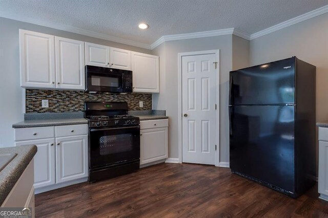 6251 Lamp Post Pl, Atlanta, GA 30349 - kitchen featuring black appliances, white cabinetry, dark wood-style floors, backsplash, and a textured ceiling