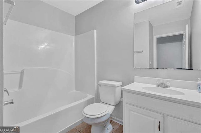 full bathroom featuring tile patterned flooring, visible vents, toilet, shower / bath combination, and vanity