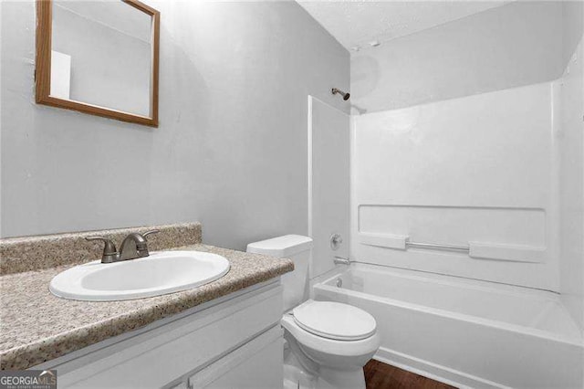 2895 Wildflower Ln, Snellville, GA 30039 - bathroom featuring vanity, shower / tub combination, and wood finished floors