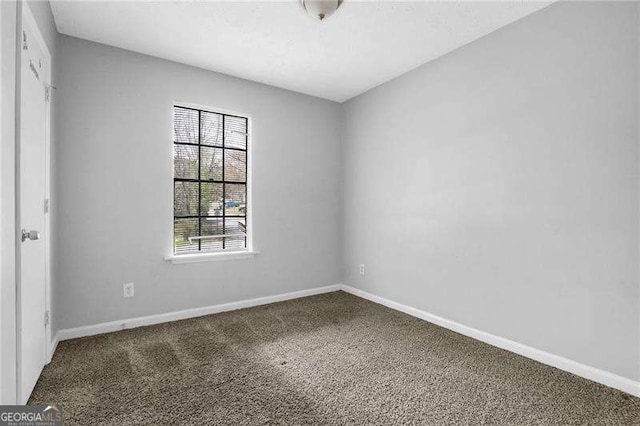 2895 Wildflower Ln, Snellville, GA 30039 - empty room featuring carpet flooring and baseboards