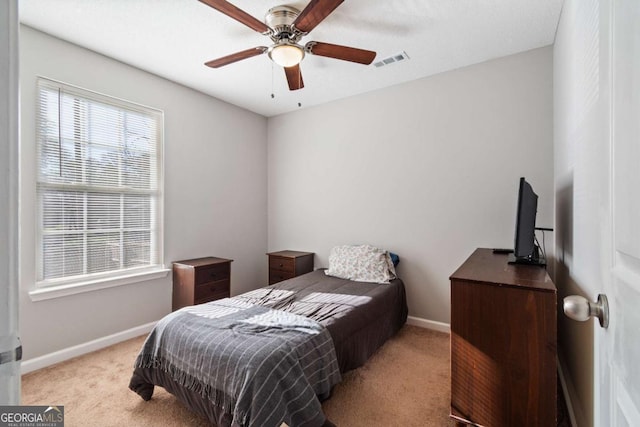 32 Martin Luther King Jr Dr, Commerce, GA 30529 - carpeted bedroom featuring baseboards, ceiling fan, and visible vents