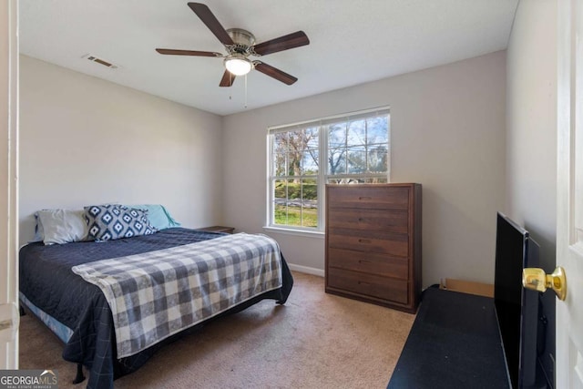 32 Martin Luther King Jr Dr, Commerce, GA 30529 - carpeted bedroom with a ceiling fan, baseboards, and visible vents