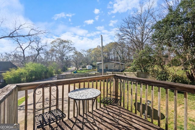 32 Martin Luther King Jr Dr, Commerce, GA 30529 - deck featuring a fenced backyard and a yard