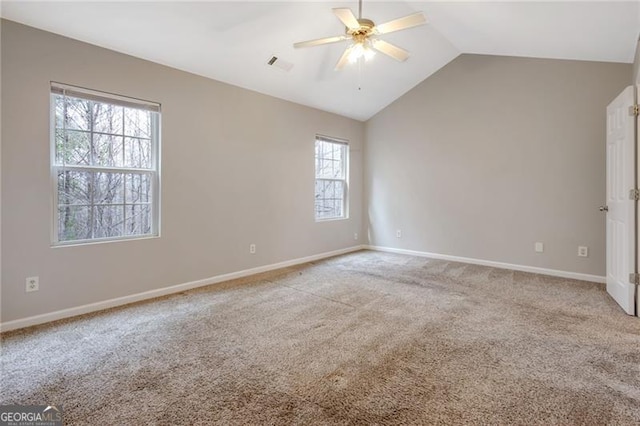 5027 Lower Elm St, Atlanta, GA 30349 - spare room featuring lofted ceiling, ceiling fan, and light carpet