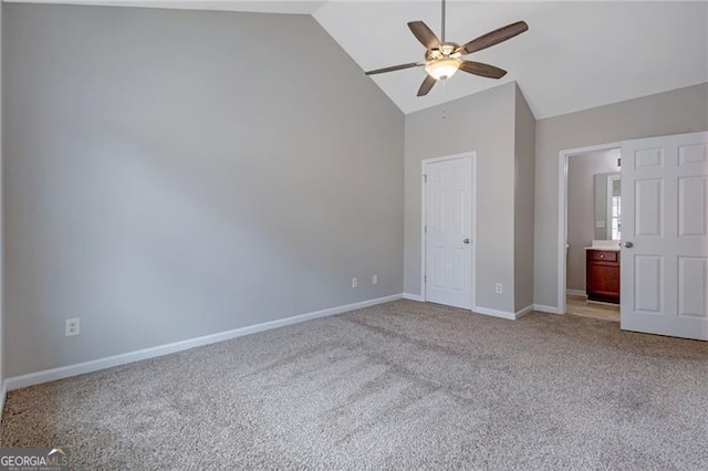 5027 Lower Elm St, Atlanta, GA 30349 - unfurnished bedroom with carpet, high vaulted ceiling, ceiling fan, and ensuite bath