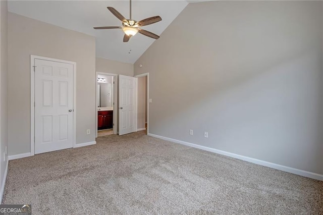 5027 Lower Elm St, Atlanta, GA 30349 - unfurnished bedroom featuring carpet, high vaulted ceiling, ensuite bath, and ceiling fan