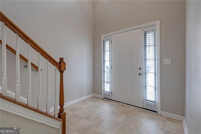 5027 Lower Elm St, Atlanta, GA 30349 - entrance foyer featuring stairway