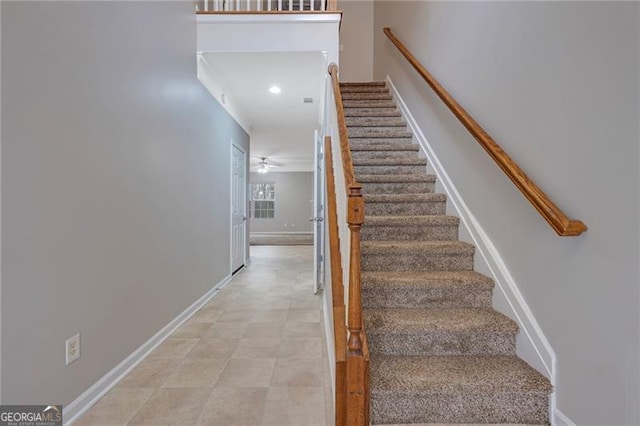 5027 Lower Elm St, Atlanta, GA 30349 - stairs featuring baseboards and ceiling fan