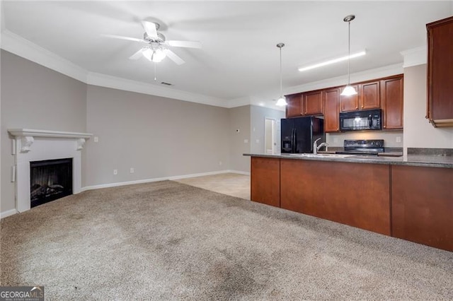 5027 Lower Elm St, Atlanta, GA 30349 - kitchen with black appliances, light colored carpet, a ceiling fan, crown molding, and a peninsula