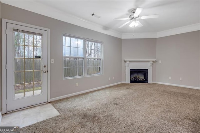 5027 Lower Elm St, Atlanta, GA 30349 - unfurnished living room featuring ornamental molding, carpet floors, a ceiling fan, and a fireplace