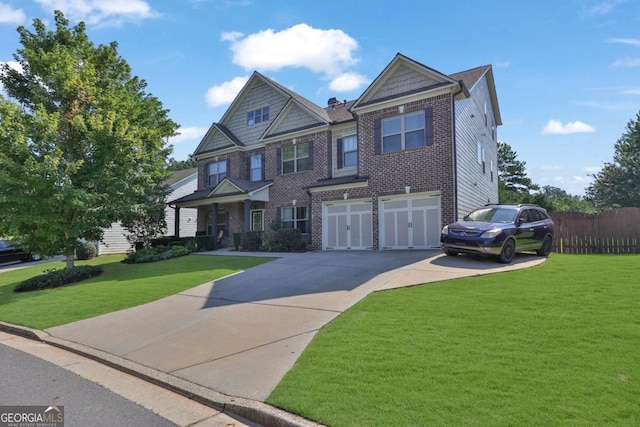 view of front facade with driveway, a front yard, an attached garage, and brick siding
