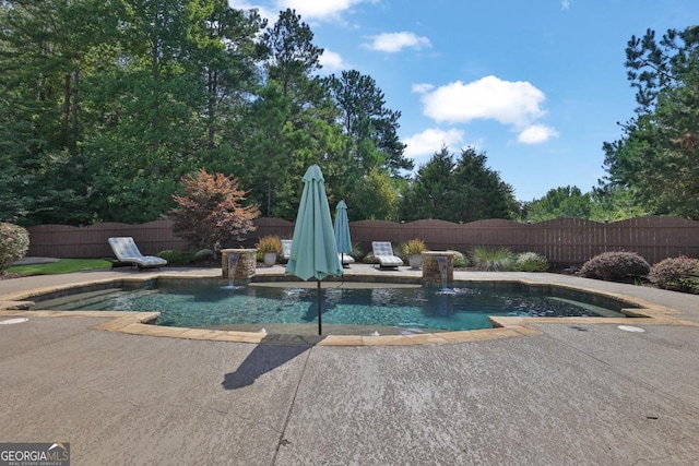 view of pool with a fenced backyard, a fenced in pool, and a patio