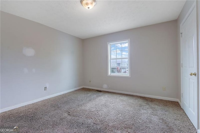 864 Oakhill Ct, Stone Mountain, GA 30088 - empty room featuring carpet floors