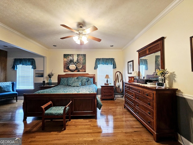 403 Holiday Rd, Franklin, GA 30217 - bedroom with a textured ceiling, light wood-style flooring, and crown molding