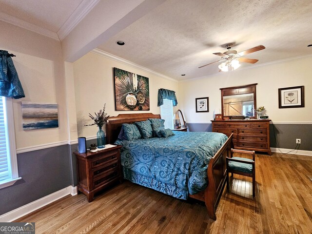 403 Holiday Rd, Franklin, GA 30217 - bedroom with multiple windows, a textured ceiling, wood finished floors, and crown molding