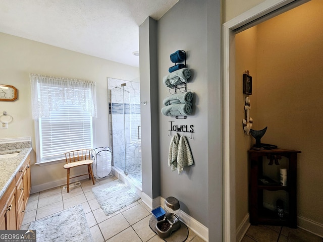 403 Holiday Rd, Franklin, GA 30217 - full bathroom featuring tile patterned flooring, a shower stall, vanity, and baseboards