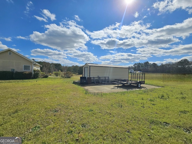 403 Holiday Rd, Franklin, GA 30217 - view of yard featuring an outdoor structure and a patio area