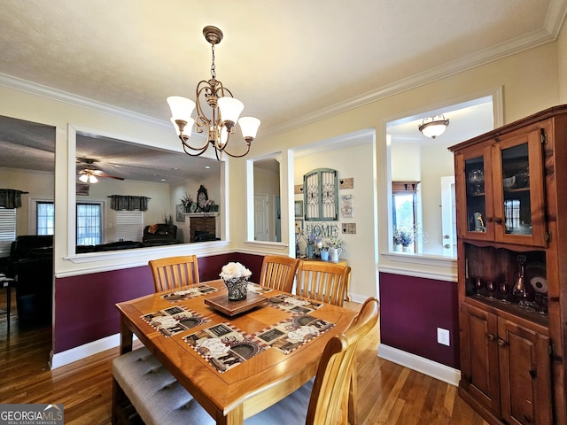 403 Holiday Rd, Franklin, GA 30217 - dining area featuring dark wood-type flooring and crown molding