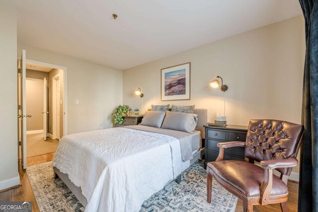 3201 Lenox Rd NE Unit 16, Atlanta, GA 30324 - bedroom featuring wood finished floors and baseboards