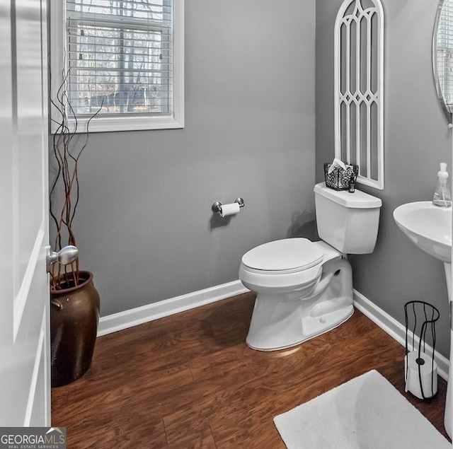 310 Persimmon Dr, Sharpsburg, GA 30277 - bathroom with baseboards and wood finished floors