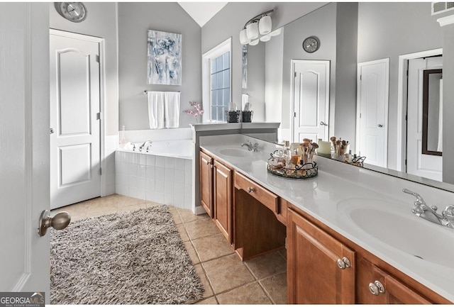 310 Persimmon Dr, Sharpsburg, GA 30277 - full bath with double vanity, vaulted ceiling, tile patterned flooring, and a bath