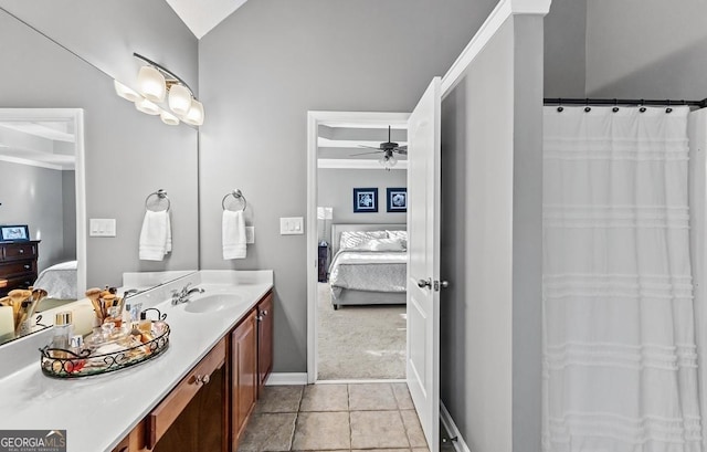 310 Persimmon Dr, Sharpsburg, GA 30277 - ensuite bathroom with vanity, a ceiling fan, and tile patterned floors
