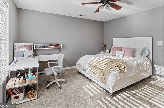 310 Persimmon Dr, Sharpsburg, GA 30277 - carpeted bedroom featuring ceiling fan and baseboards