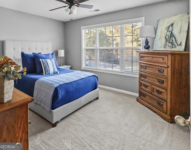 310 Persimmon Dr, Sharpsburg, GA 30277 - carpeted bedroom with baseboards and a ceiling fan