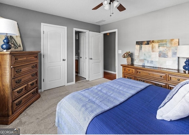 310 Persimmon Dr, Sharpsburg, GA 30277 - bedroom with light colored carpet and a ceiling fan