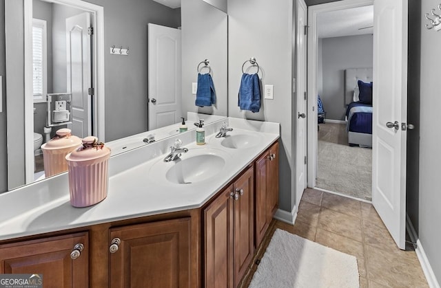 310 Persimmon Dr, Sharpsburg, GA 30277 - full bath with double vanity, ensuite bathroom, and tile patterned floors