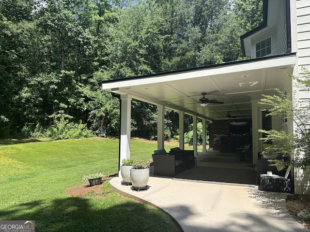 310 Persimmon Dr, Sharpsburg, GA 30277 - view of parking with a ceiling fan