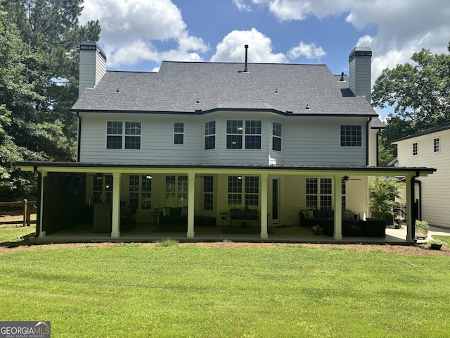 310 Persimmon Dr, Sharpsburg, GA 30277 - rear view of property with an outdoor living space, a patio area, and a chimney