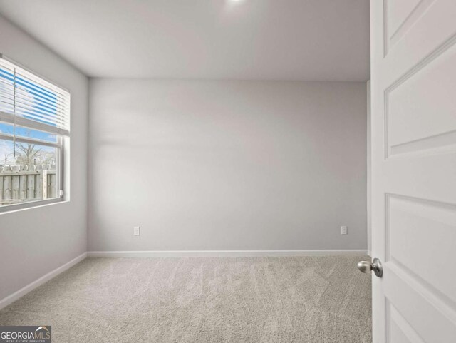 2027 Massey Ln, Winder, GA 30680 - spare room with carpet flooring and baseboards