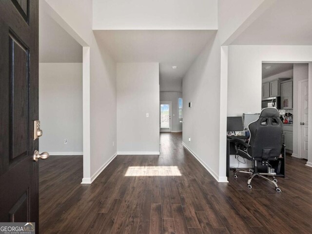 2027 Massey Ln, Winder, GA 30680 - foyer entrance featuring dark wood-style floors and baseboards